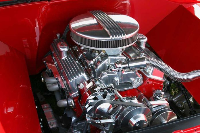 shutterstock_4607557.jpg Close-up of a shiny chrome engine inside a red car