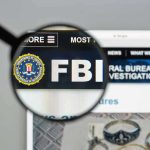 Her Phone Was Reset Then She Was Found Dead FBI website shown through magnifying glass.
