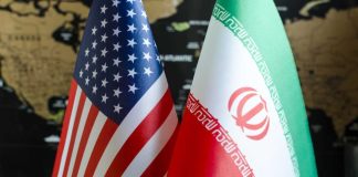 The Fourth Amendment Fight That Finally Reached a Breaking Point Flags of the United States and Iran displayed together