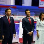 Public figures stand in line at a Fox News event.