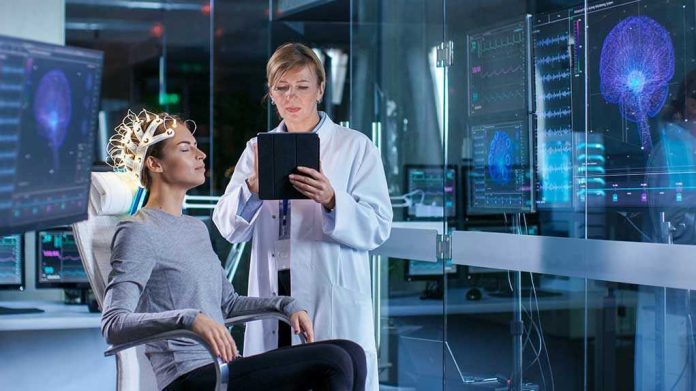 1036798276 Woman undergoing brain scan with doctor monitoring results