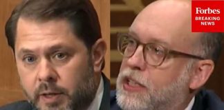 Rules For Them: Gallego Walks, Voters Fume 'It Was Illegal!': Gallego And Vought Spar Over Navy Federal Credit Union Surprise Overdraft Fees