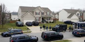 FBI Blitz Stops Chilling UFC Ambush FBI agents conducting an operation in a suburban neighborhood