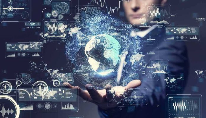 shutterstock_1065245777 Businessperson holding a digital globe with data interfaces