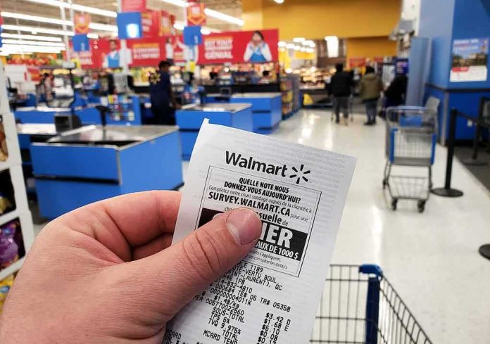 shutterstock_1448498210 Hand holding a store receipt at a supermarket checkout area