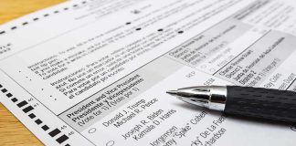 Court Smacks Down Troop Paperwork Gambit Ballot paper with pen on wooden surface