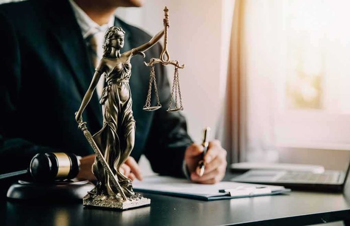 Lady Justice statue on a lawyer’s desk