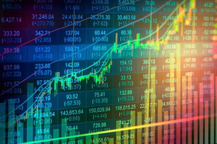 shutterstock_416888221 Stock market chart with rising candlesticks and trend lines