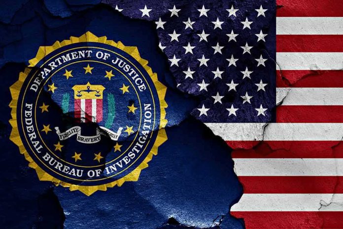 shutterstock_1023380488 FBI seal and American flag on cracked wall