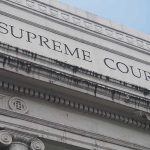 Statewide Voting Operation Leads To 20 Charges Supreme Court building facade with classical columns