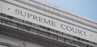 Statewide Voting Operation Leads To 20 Charges Supreme Court building facade with classical columns