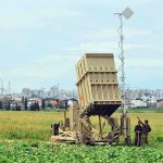 Iranian Barrage Drags Kuwait Into Line of Fire Military defense system deployed in a field with soldiers nearby