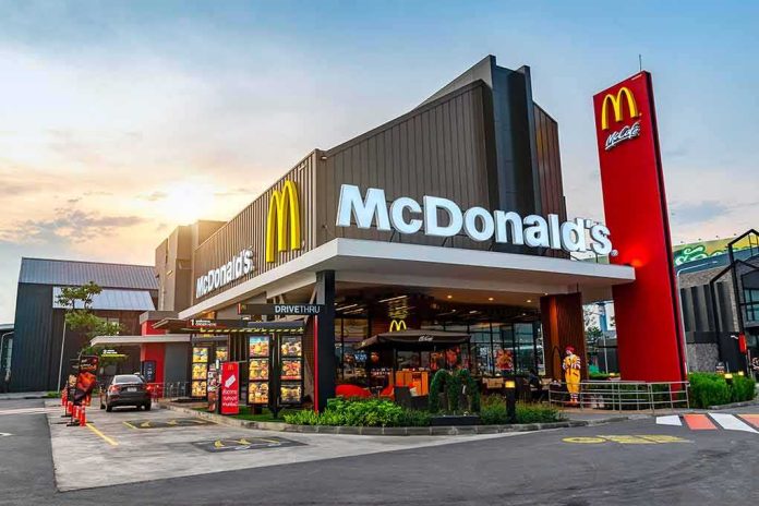 shutterstock_1181606473 McDonald's restaurant exterior with drive-thru at sunset