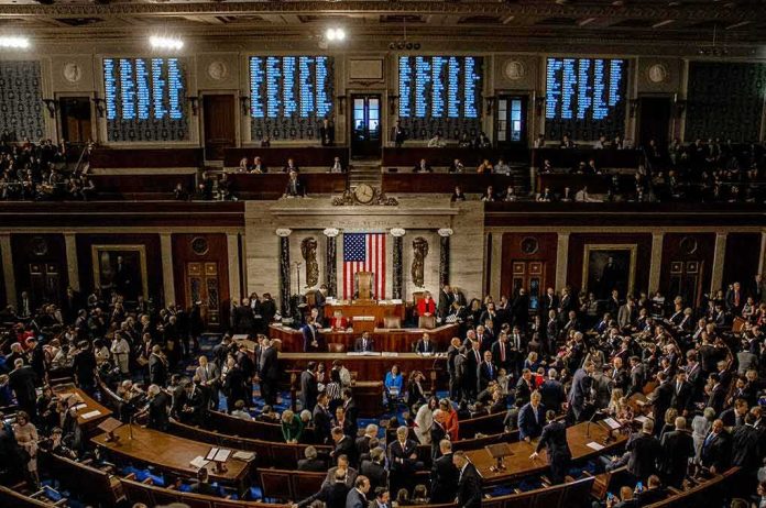 shutterstock_1186368277-1 U.S. House chamber with lawmakers gathered before a session