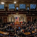 War Spending Clash: Fight Over Where America’s Money Goes U.S. House chamber with lawmakers gathered before a session