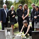 Celebrity Heir Dies In Rehab – Autopsy Pending Mourners gathered at a graveside placing flowers