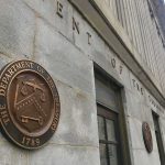 Trump – Xi Gambit – Leverage, Not Peace U.S. Treasury building exterior with bronze seal on stone wall