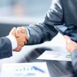 Washington Floats Wild AI Alert Lane Businesspeople handshake at meeting table
