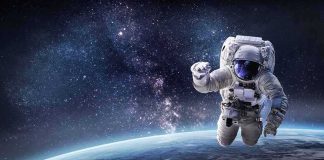 Astronaut floating above Earth against a starry galaxy backdrop