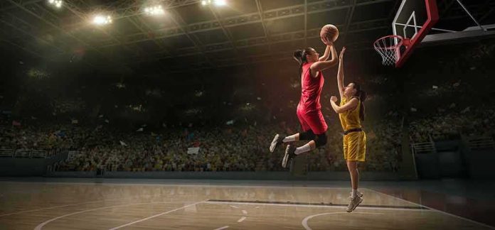 Two women playing basketball; Michelle Jenneke is not visible