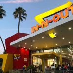 In-N-Out Mayhem: Customer Leaps Into Danger In-N-Out Burger restaurant exterior at dusk