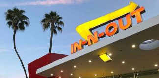 In-N-Out Mayhem: Customer Leaps Into Danger In-N-Out Burger restaurant exterior at dusk
