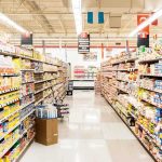 Nationwide Price Hike Hiding In Plain Sight A grocery store aisle filled with various food products on shelves