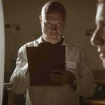 Mother Walks From Prison? Psychosis Cited Scientist with clipboard observes woman beside spiral target