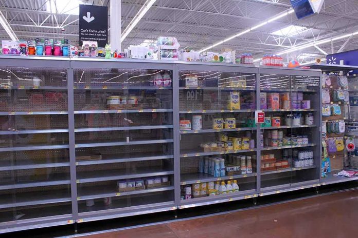 shutterstock_1676635483 Partially empty store shelves with baby formula and supplies