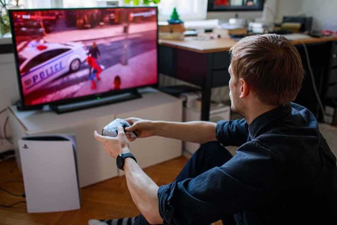 man playing video game on a TV with a controller