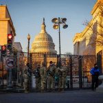 Checkpoints Are Appearing Across Iranian Cities National Guard troops stand at a security fence near the U.S. Capitol