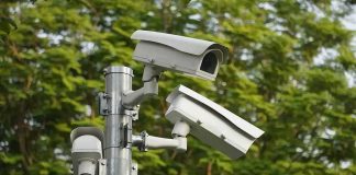 Creepy Cop Turns Cameras Into Stalker Tool surveillance cameras mounted on a metal pole