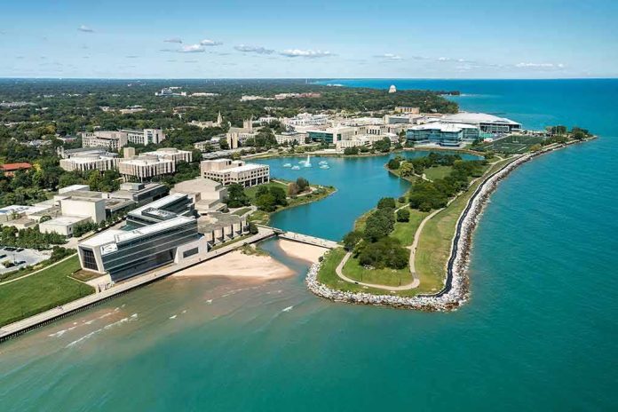 shutterstock_2041006499 aerial view of a lakeside university campus with lagoon and curved shoreline