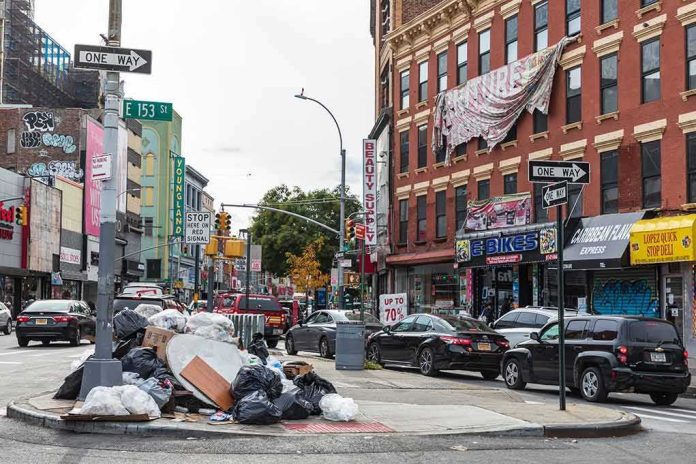 Street corner with piled garbage bags and traffic near brick storefronts