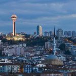 Court Fight Looms Over Denmark’s Prayer Ban Ankara skyline at dusk with Atakule tower and a mosque