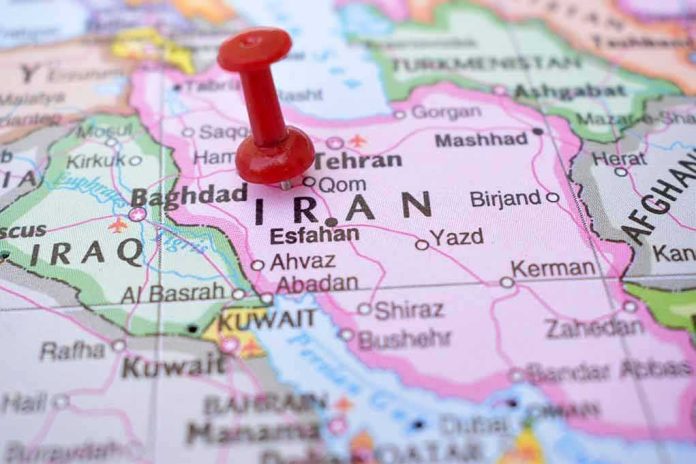 Red pushpin on a map of Iran