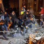 Aid Stalls, Streets Choke — Lives Slip Away Rescue workers dig through rubble at night