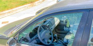 Car with shattered driver-side window