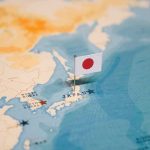 Tsunami Hype Explodes — Japan Says No Japanese flag pin marking Japan on a world map