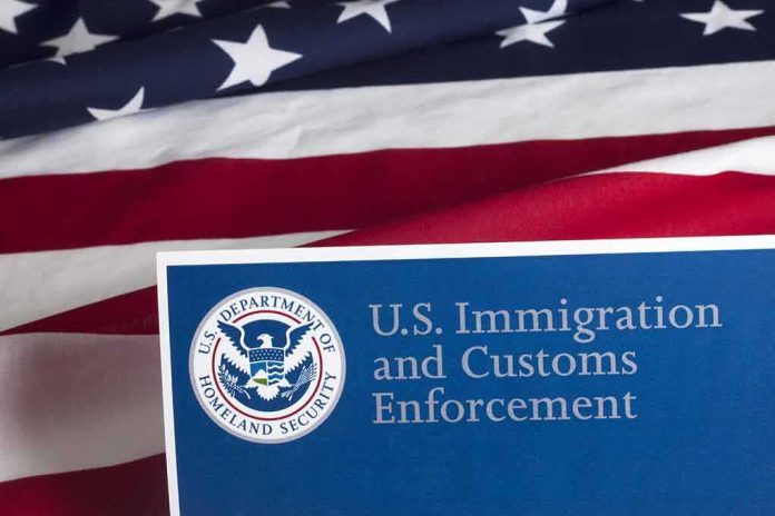 shutterstock_300476915-1 U.S. ICE document against American flag