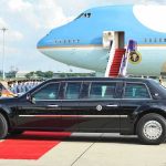 Secret Service Scrambles After Tehran Chants Presidential limousine beside a large blue-and-white jet on a runway