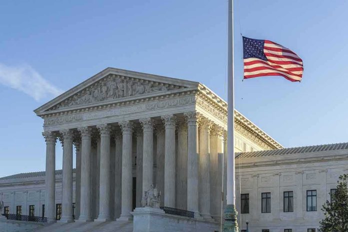 United States Supreme Court building with flag at half-staff