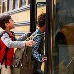 Shock Arrests Near Schools Trigger Child Meltdown Children boarding a yellow school bus