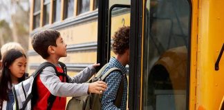 Shock Arrests Near Schools Trigger Child Meltdown Children boarding a yellow school bus