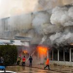 Midnight Inferno Traps Dozens In Bathrooms firefighters respond to large building fire with heavy smoke