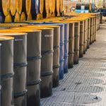What Caused This Hazmat Emergency For 50,000 People? Rows of industrial metal barrels with yellow lids