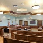 Custody Hearing Ends, 4-Year-Old Is Dead by Night Empty courtroom with wooden benches and judge's bench