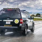 Detainer Meltdown: Fairfax Lets Them Go Sheriff SUV driving on a highway