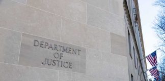 Chilling Rooftop Claim Sparks Federal Swoop Department of Justice building exterior with American flags