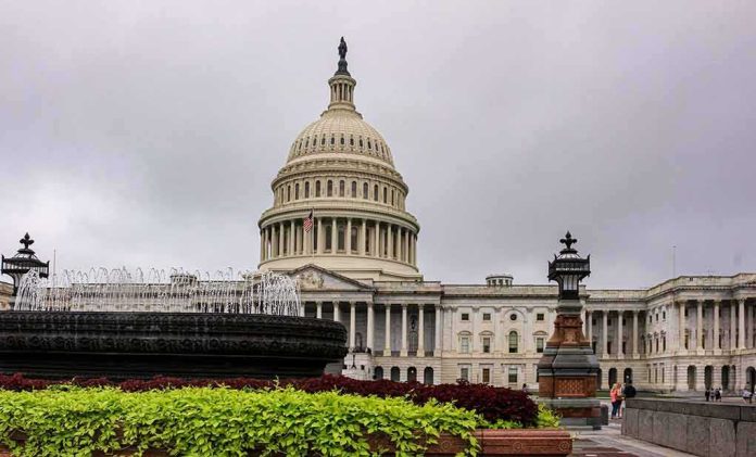 United States Capitol building with dome and fountain in foreground